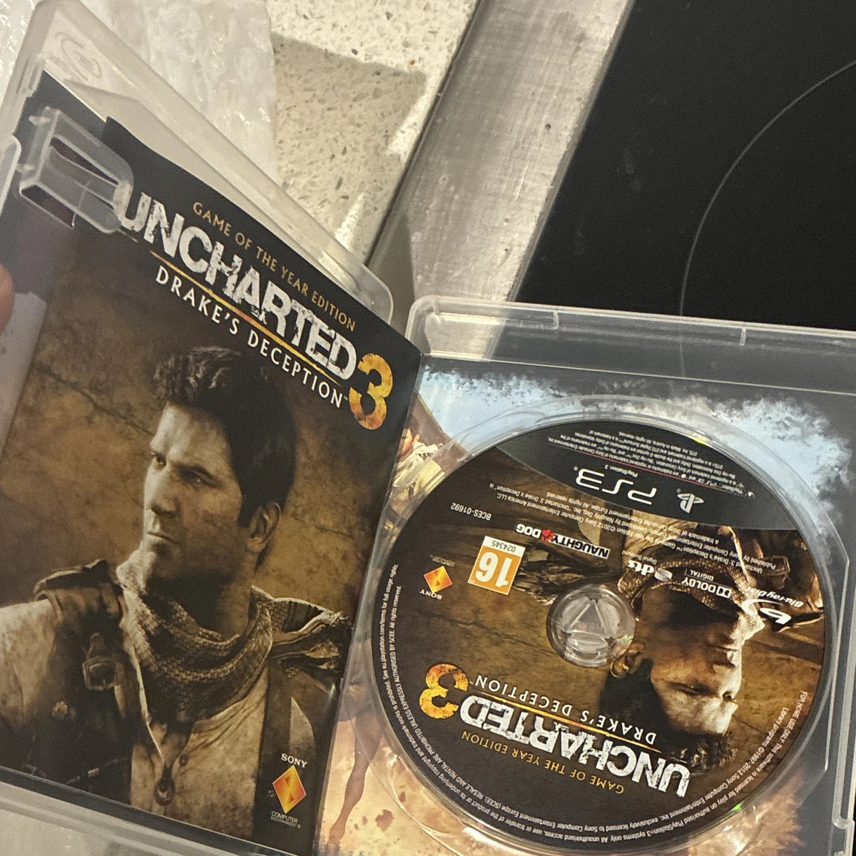 Sony PS3 Super Slim 12GB ConsoleBundle w/ Pad, Box & Uncharted 3 Game