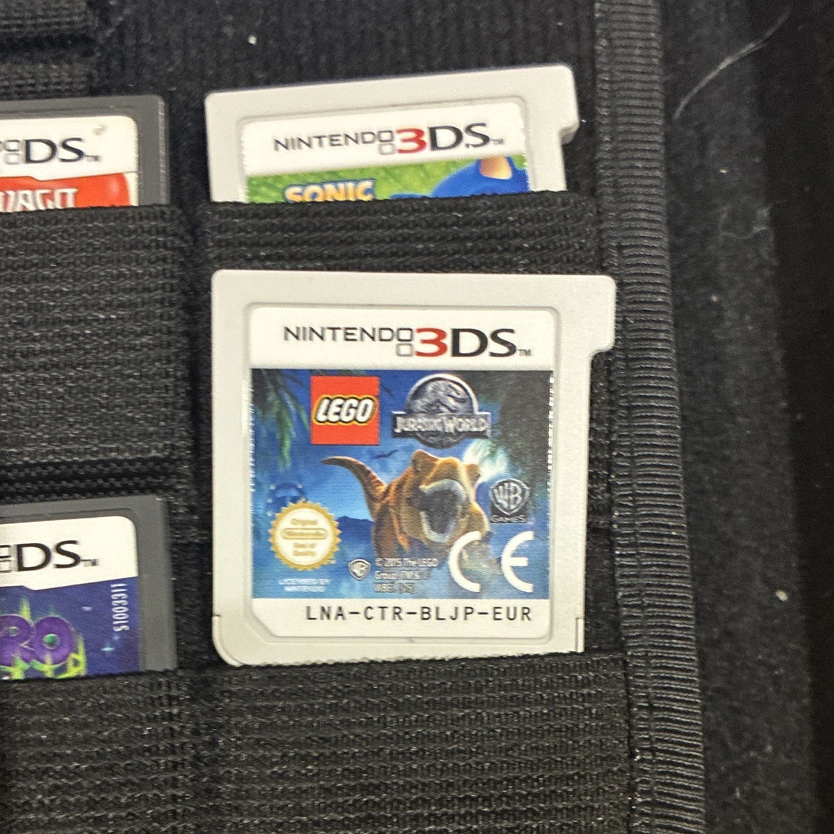 Nintendo 2DS XL Black/Green Bundle w/ Case Charger Stylus & 4 Games (Shown)