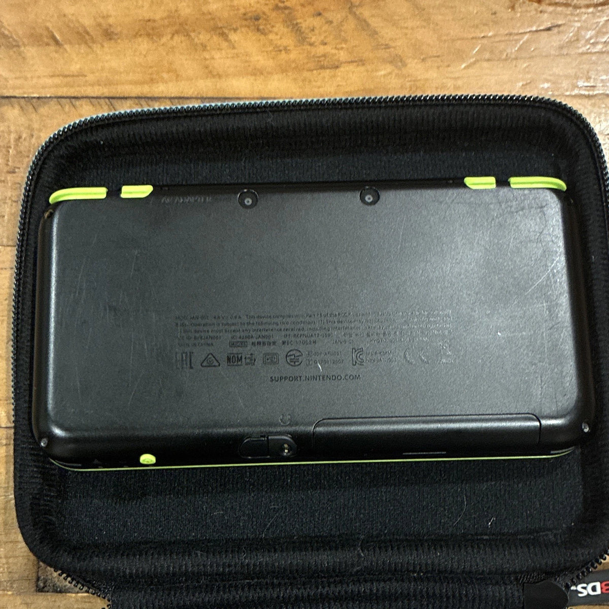 Nintendo 2DS XL Black/Green Bundle w/ Case Charger Stylus & 4 Games (Shown)
