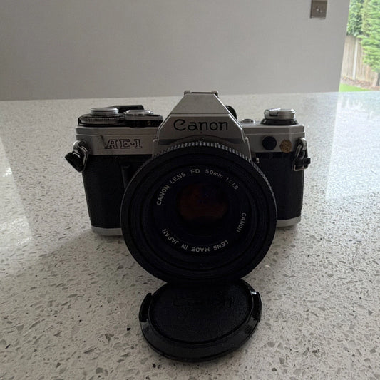 Canon AE-1 Silver 35mm SLR Film Camera with Canon FD 50mm f/1.8 Lens UNTESTED