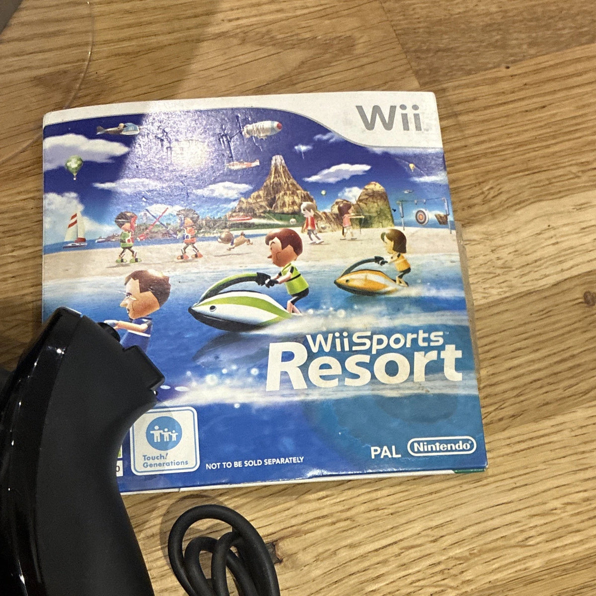 Nintendo Wii Black Console Bundle w/ Remote, Nunchuk & Wii Sports Resort Game