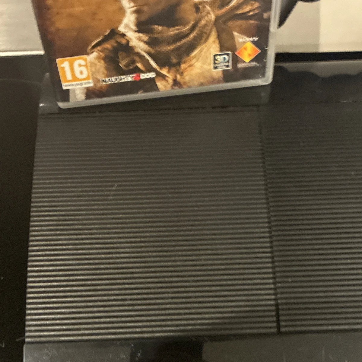 Sony PS3 Super Slim 12GB ConsoleBundle w/ Pad, Box & Uncharted 3 Game